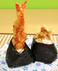 Left: "Ebi ten omusubi" (Shrimp tempura) Right: "Mai-tate omusubi" (Maitake mushroom tempura)
