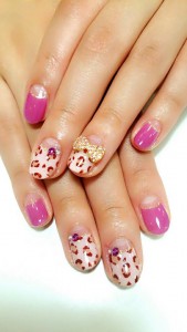 Leopard print design and parts of stone and ribbon nail.