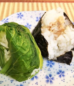 Some types of "onigiri" are wrapped with green vegetables. Right one is "tuna-mayonnaise onigiri".