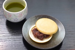 "Monaka" (bean jam filling wafers) with green tea.